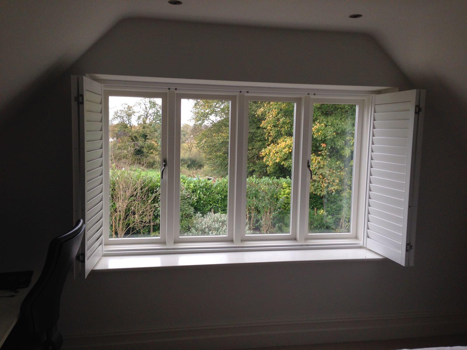 BiFolding flat window shutters, patio door shutters & bay window shutters Absolute